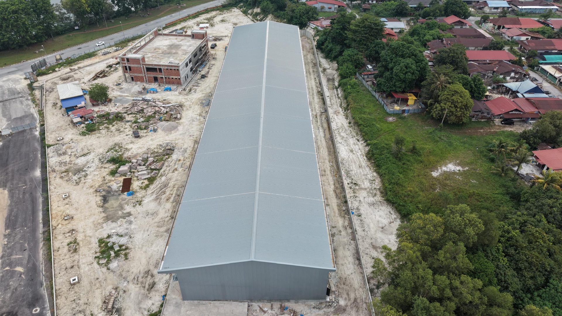 Top-down drone view of the full roof span